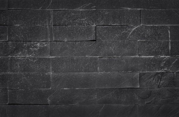 istock Dark grey black slate texture with high resolution, pattern of stone brick wall for background and design art work. 1191816330