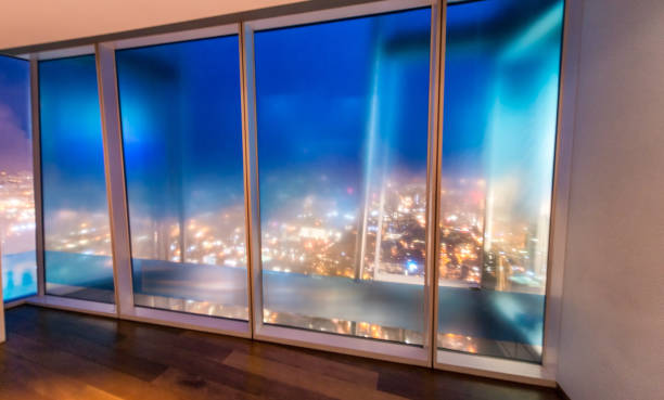 istock City night lights through big building window 1191818226