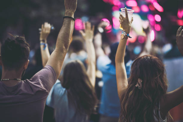istock Put your hands up high for this song! 1191818227