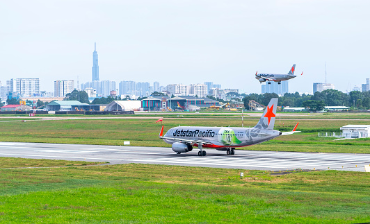 Ho Chi Minh City, Vietnam - November 27th, 2019: Airplane airbus A320 of Jetstar Pacific moving to runway prepare take off from Tan Son Nhat International Airport, Ho Chi Minh City, Vietnam.