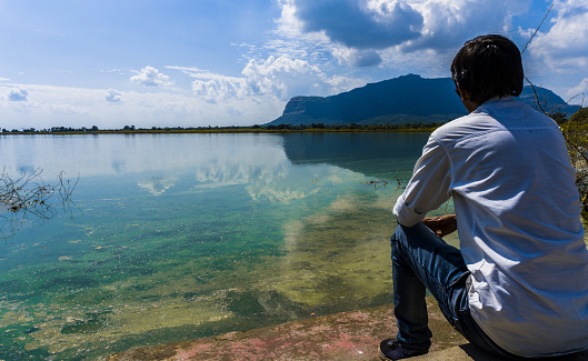 young adult man at Vadatalav Lake also known as Pavagadh lake