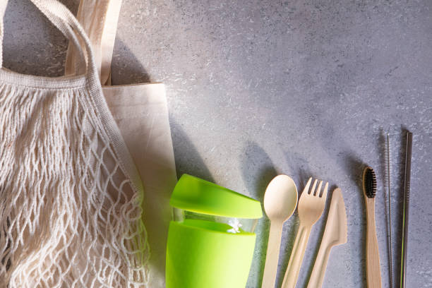 istock Canvas cotton shopping eco friendly bag and coffee mug over gray background. Zero waste, plastic free concept. 1191822384