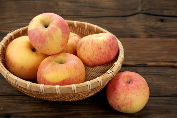 istock Fresh red apple isolated on wood. 1191827377