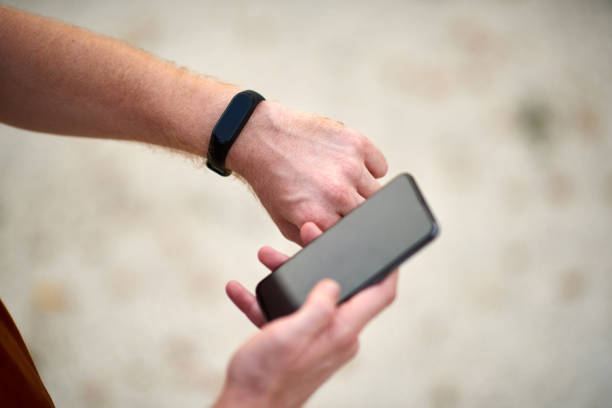 istock Man using cellphone in urban area at summer time. 1191828267