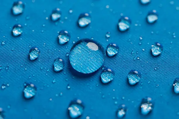 Water dropplets on a waterproof breathable fabric used for clothing