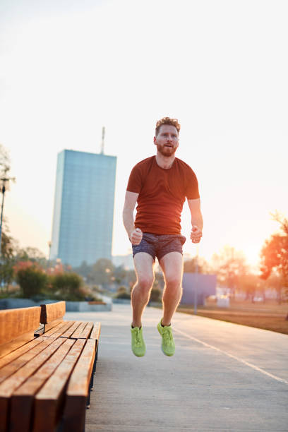 istock Modern young man working out in an urban park. 1191830684
