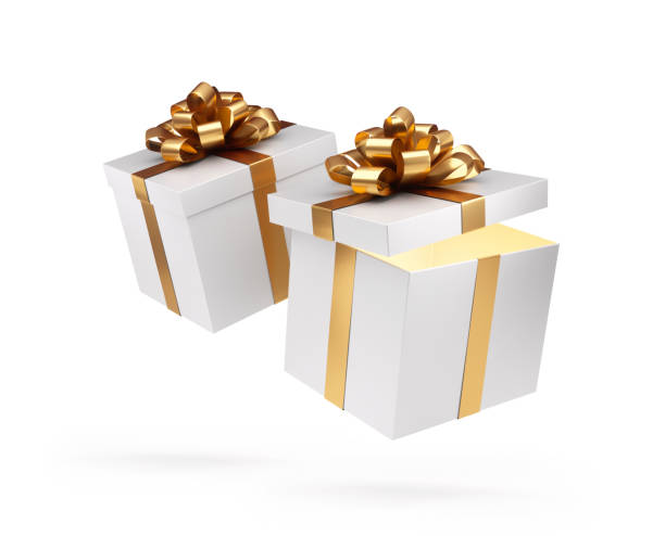 istock Two Gift Boxes Tied With Golden Ribbon 1191831317