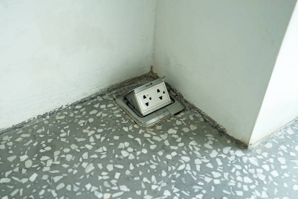 istock Close up Pop up electrical floor plug outlet on the marbled floor 1191831607