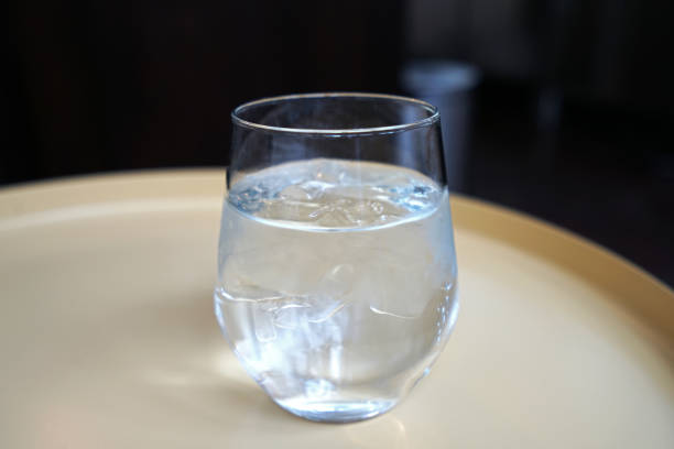 istock Close up glass of iced spring water 1191832311