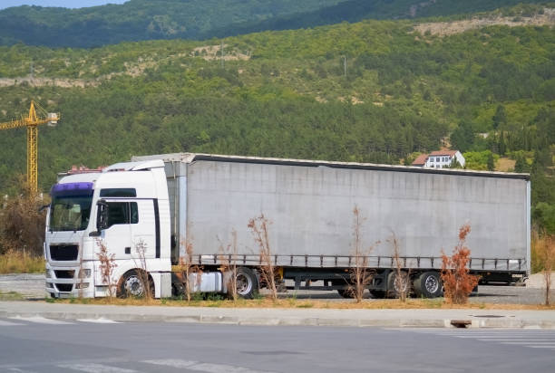 istock Big truck on a parking lot 1191833394