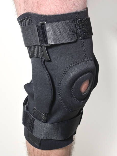 istock Man leg and Hinged knee brace 1191838675