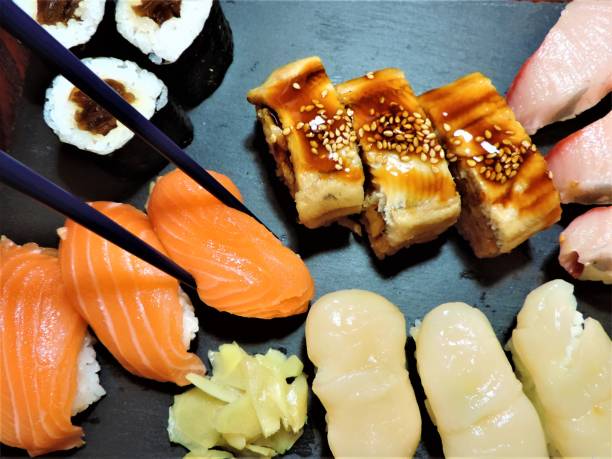 istock Eating sushi. Close-up. 1191841213