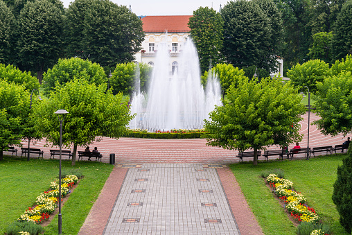 Loznica, Serbia - July 13, 2019: Medical wellness center Banja Koviljaca, Serbia. Beautiful fountain in center of Banja Koviljaca.