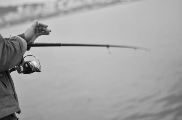 istock fishing black and white photo 1191843414