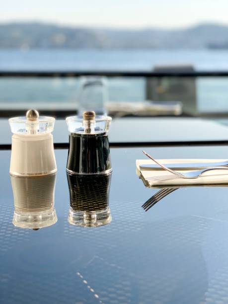 istock Salt and pepper on a fine restaurant table 1191844429
