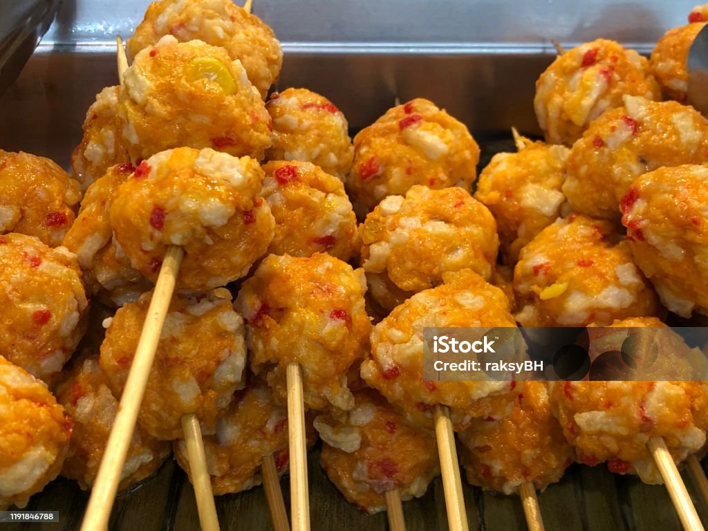 Close Up Of Squid Balls On Sticks Popular Street Food In The