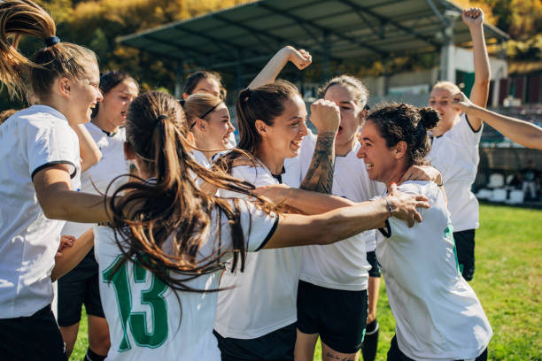 istock Female soccer team celebrating victory 1191846890