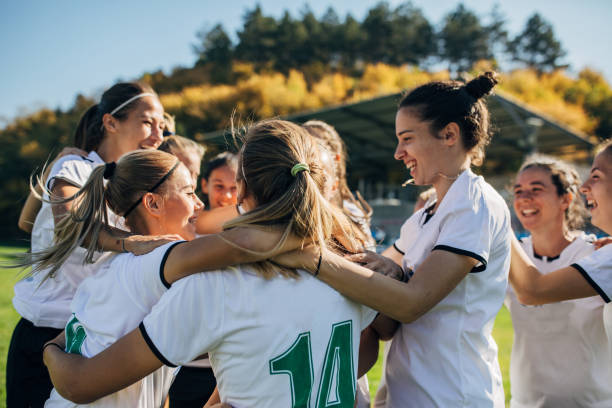istock Women soccer team celebrating victory 1191846918