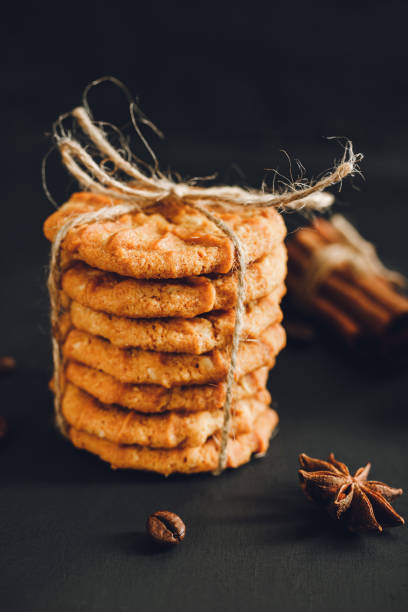 istock Homemade cookies stacked on dark background 1191849320