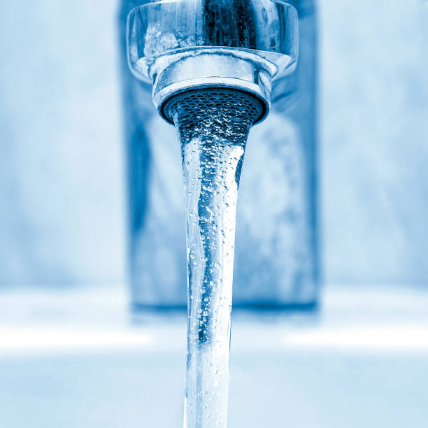 istock Faucet with flowing crystal clear water 1191849971