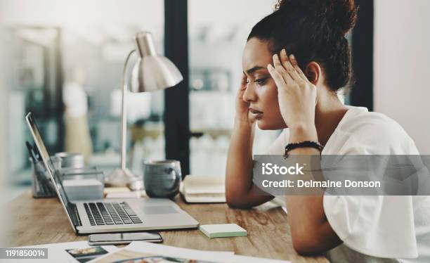 When Hard Work Results In A Headache Stock Photo - Download Image Now - Emotional Stress, Mental Burnout, Working
