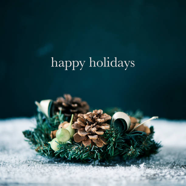 christmas wreath and text happy holidays
