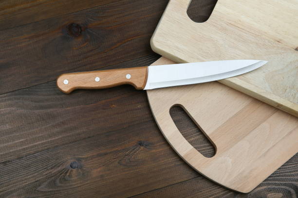 istock kitchen knife with a wooden handle on a cutting board with copy space 1191852289