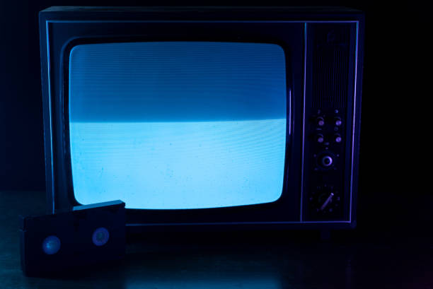 istock Static noise on a vintage TV set in black background 1191855016