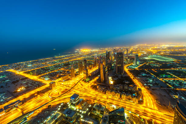istock Aerial view on Sheikh Zayed Road, Dubai Downtown at dawn This image is GPS tagged 1191855313