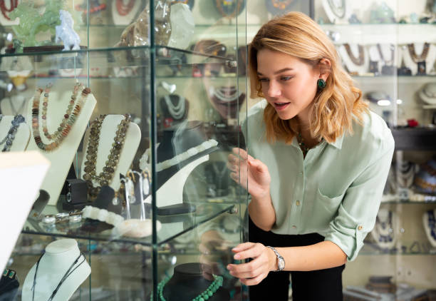 istock Girl choosing natural stone necklace 1191856019