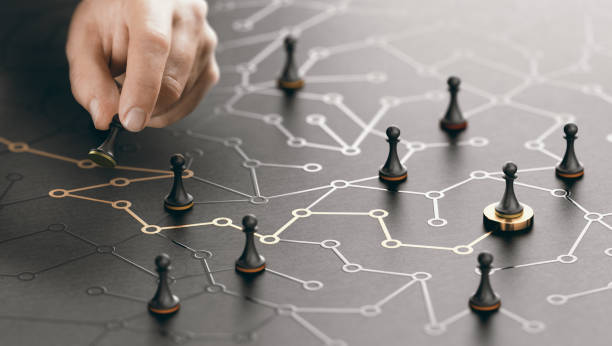 Strategic business plan represented by chess pawn pieces on a table