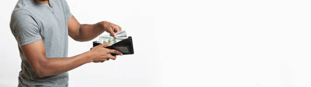 istock African man showing full wallet with dollar banknotes 1191857323