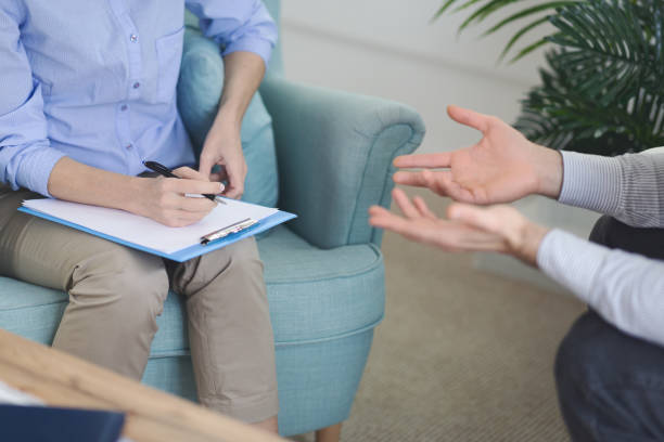istock Private consultant making notes during conversation with emotional patient 1191861860