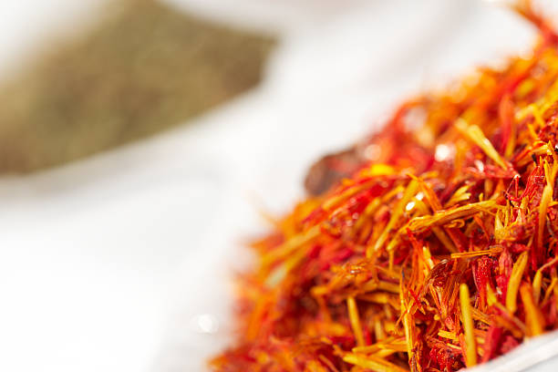 Saffron and green spice in porcelain dish