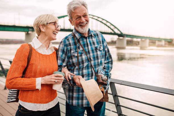 istock Senior tourists enjoying by the river 1191865379