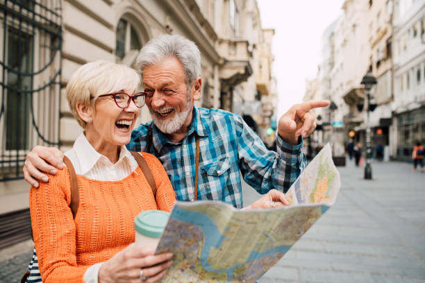 istock Senior couple on vacation having fun exploring 1191865443
