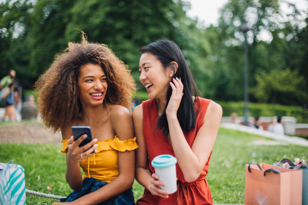 istock Two girls resting after shopping and having fun 1191865526
