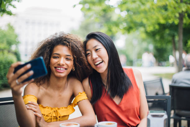istock Best friends taking a selfie at the cafe 1191865534
