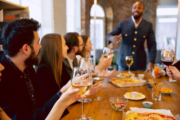 istock Happy co-workers celebrating while company party and corporate event 1191871240