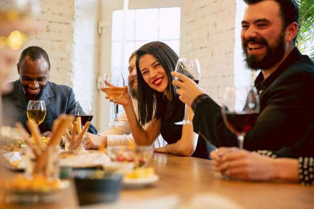 istock Happy co-workers celebrating while company party and corporate event 1191871477