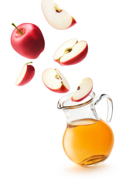 Apple juice and red apples isolated on white background