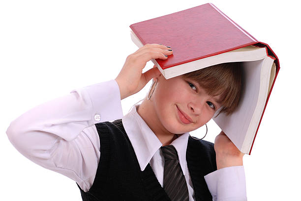 istock Girl holds the open book on a head 119187261