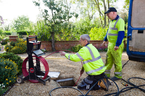 Drain cleaning company check blocked drain BUCKINGHAM, UK - October 16, 2019. A drain cleaning company checks a blocked drain with a camera prior to jetting jetting stock pictures, royalty-free photos & images