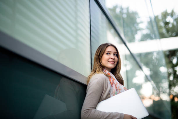 istock Beautiful young woman working as a freelancer on laptop 1191874506