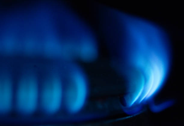 istock A Macro Image of a Blurry Blue Flames on Gas Stove Burner. 1191877486