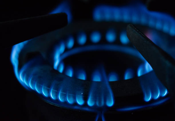 istock A Macro Image of a Blurry Blue Flames on Gas Stove Burner. 1191877491