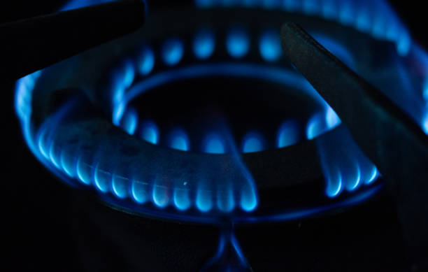 istock A Macro Image of a Blurry Blue Flames on Gas Stove Burner. 1191877508