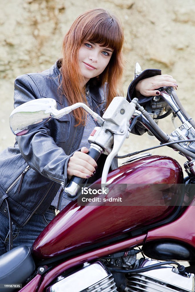 Biker girl on a motorcycle  Biker Stock Photo