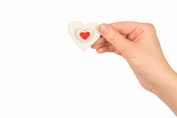 istock Red heart in woman hand isolated. 1191878968