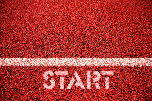 istock Starting line sign at running track background 1191881805